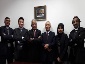 Kassim Tadin, Wai & Co. team standing together